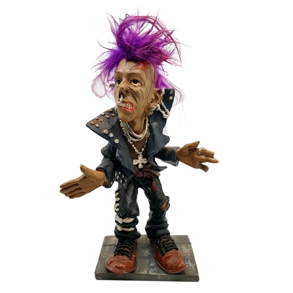 Punk style collectible figurine with purple mohawk, studded jacket, chains, and boots on base.