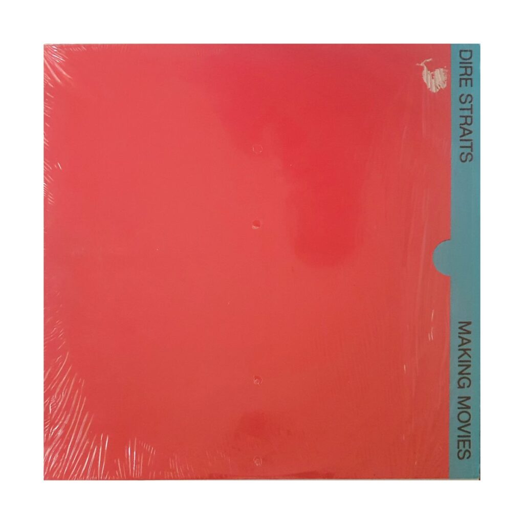 Dire Straits Making Movies album 1980 vinyl cover with minimalist red design and teal spine showing band name and album title.