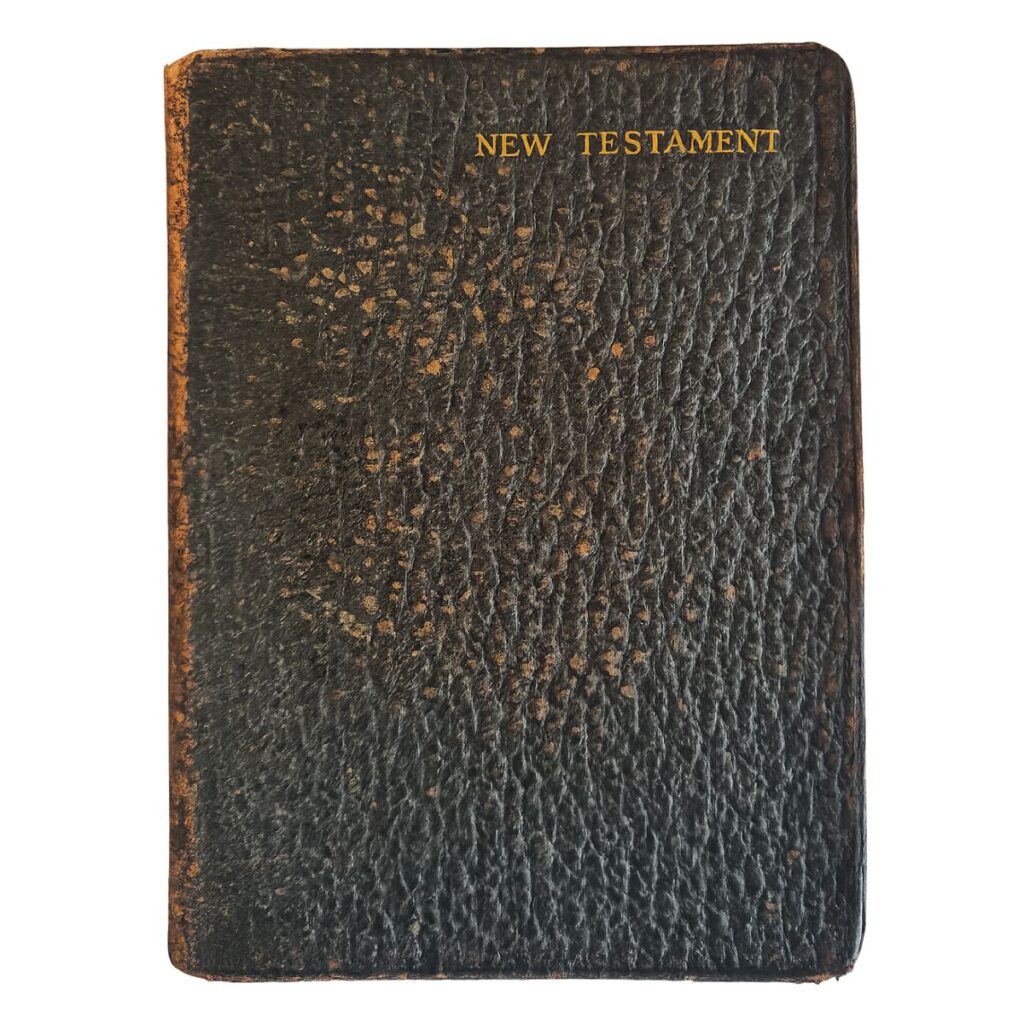 Vintage black leather New Testament Bible with gold title on cover, published by Cambridge University Press in 1916