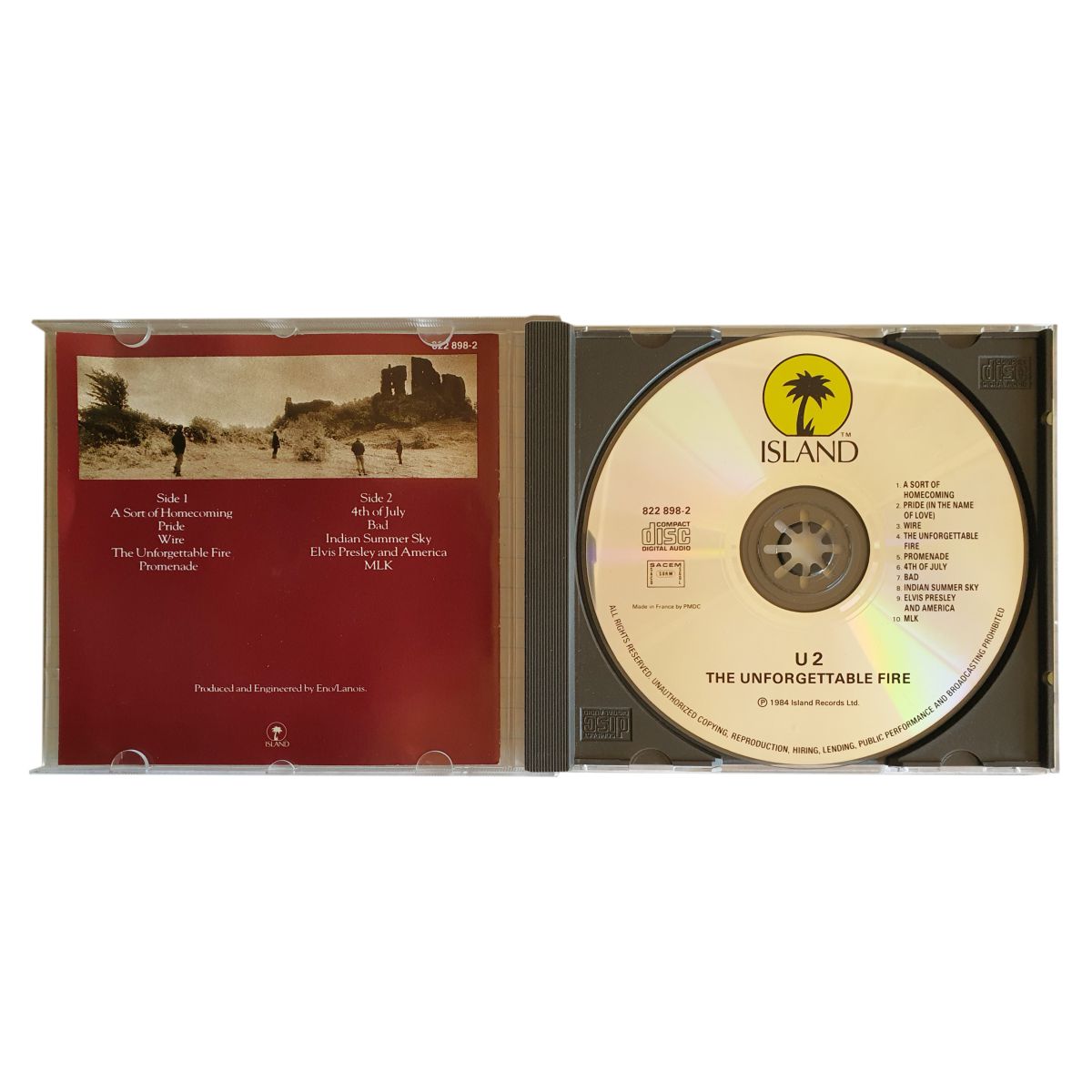 U2 The Unforgettable Fire CD 1984 Island Records 822 898-2 open jewel case showing disc and track listing